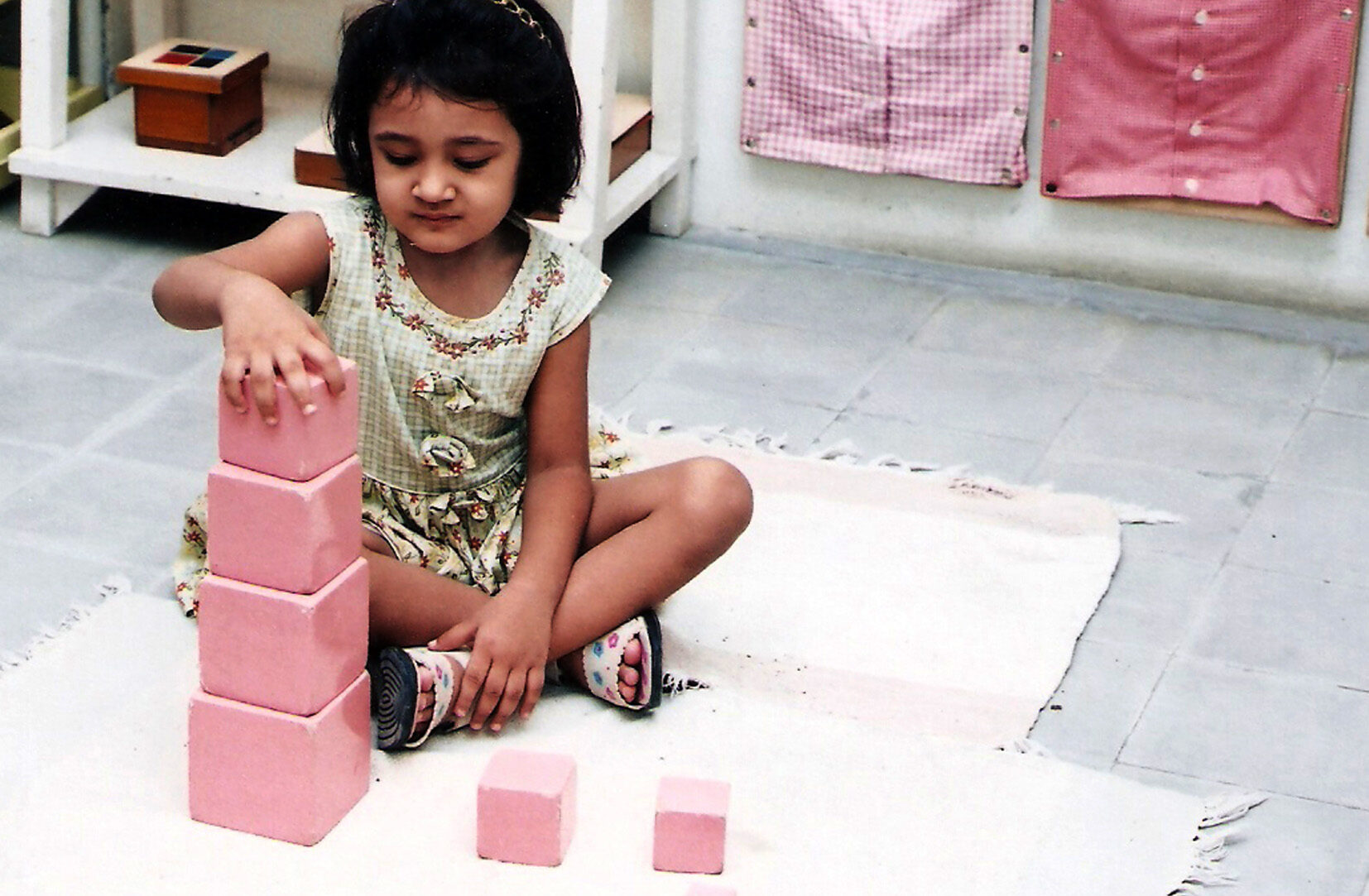 About - Child and Teacher with Painting Project